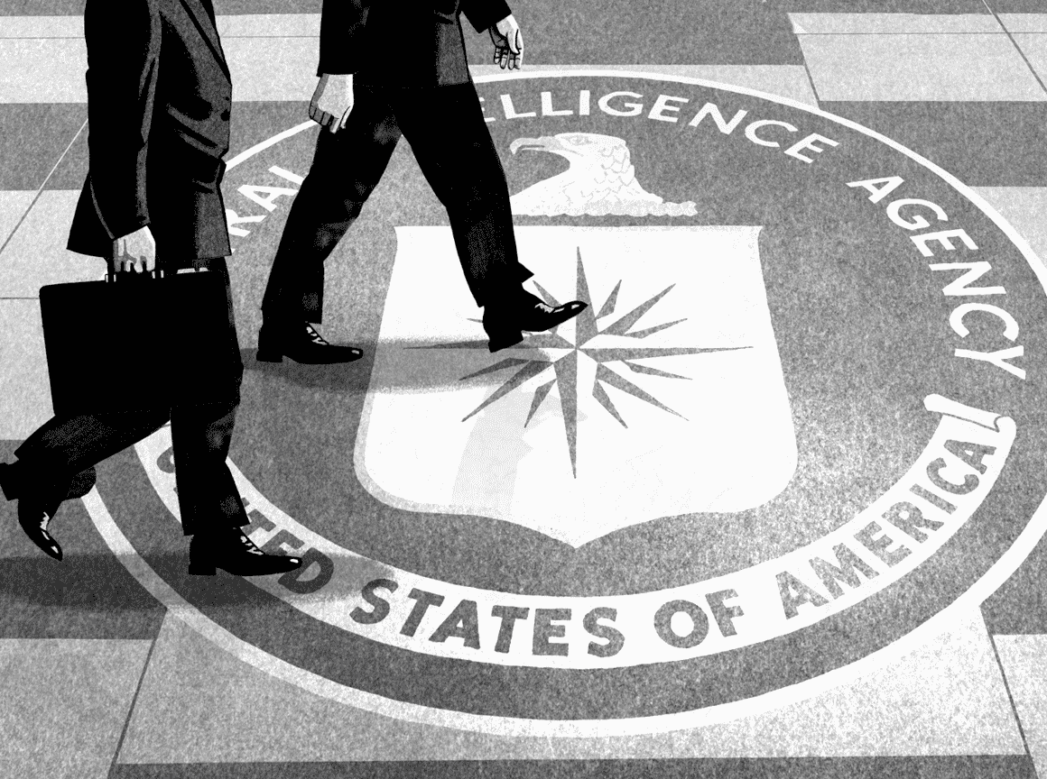 Figures of people walking on the CIA logo at CIA headquarters in Langley, VA.