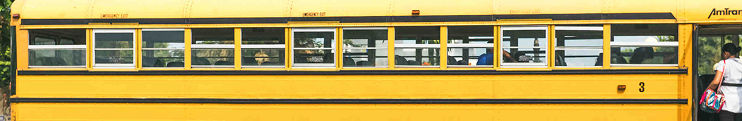 a banner of a yellow school bus