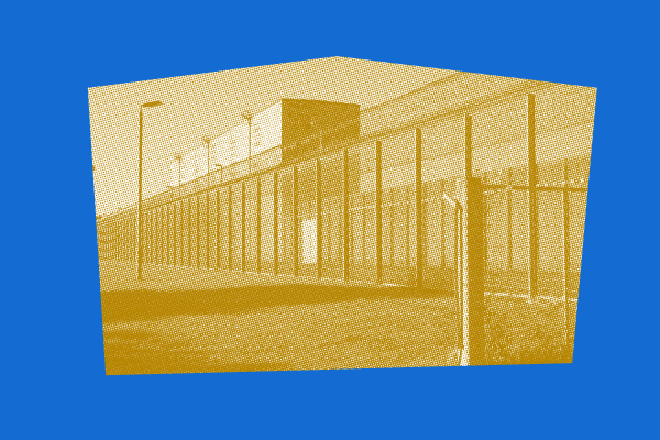 Image of a prison from outside the gate