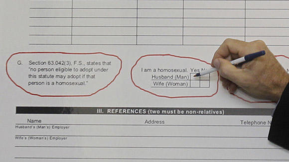 Martin Gill points to a Florida adoption form banning LGBT parents