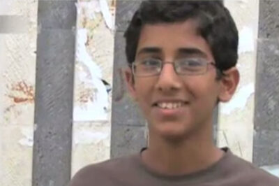 Abdulrahman Al-Aulaqi, a teenage boy with combed hair wearing glasses, smiling