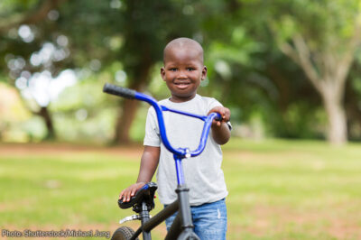 Boy with Bicycle