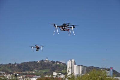 Two drones hovering in air