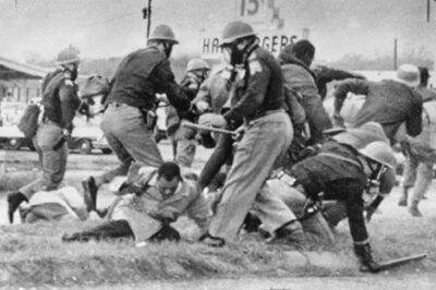 John Lewis being beaten by state troupers during Selma march