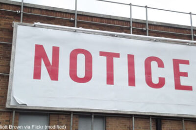 Large billboard reading "notice"