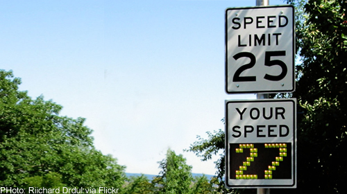 photo of radar speed sign: "Speed limit: 25 / Your speed: 27"