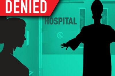 Bishop blocking hospital doors