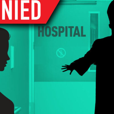 Bishop blocking hospital doors