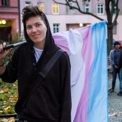 Young person with flag at Trans March Berlin 2014