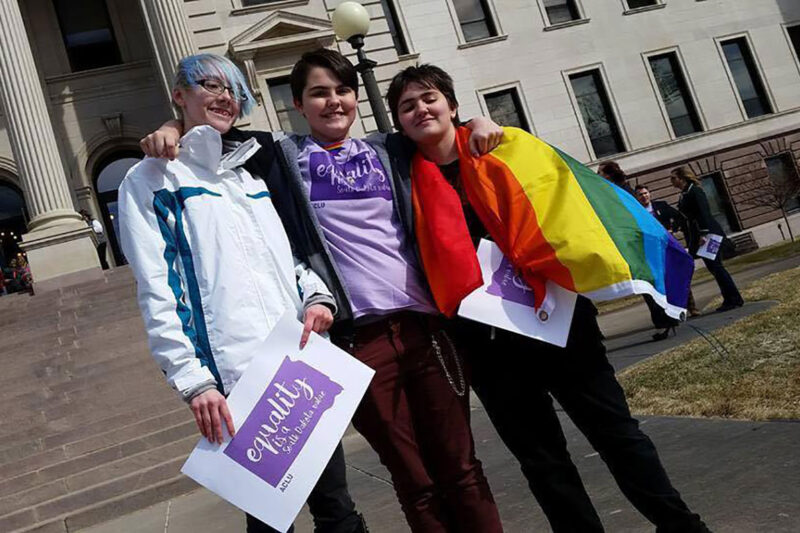 LGBT youth with flag