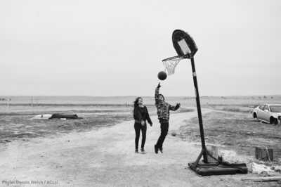 Native Kids playing basketball