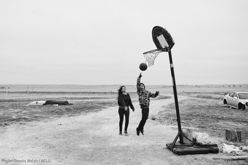 Native Kids playing basketball