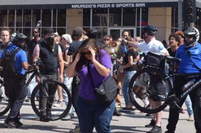 Alison Dreith getting pepper sprayed