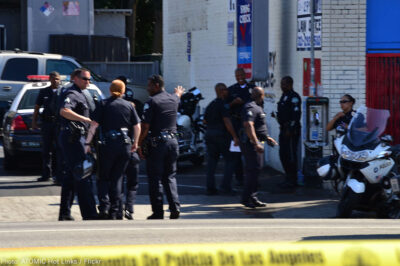 Police gather on the street