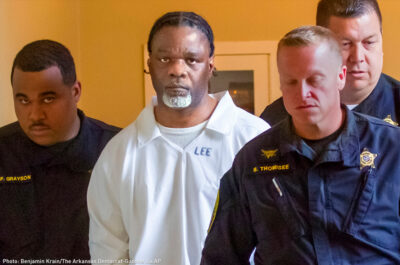 Ledell Lee Escorted by Police