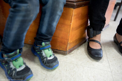 Child's feet next to mother