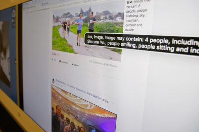 A screen displaying Facebook's facial recognition technology
