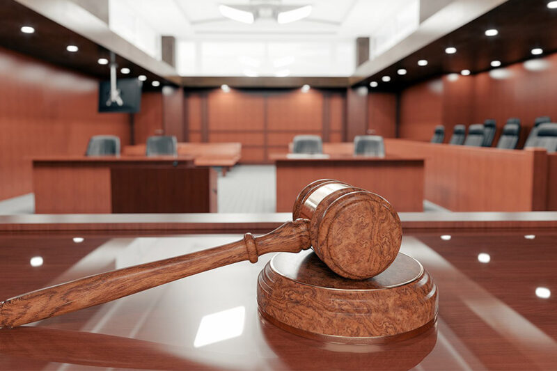 Image of a gavel in a courtroom