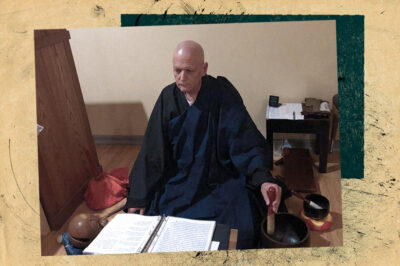Reverend Seigen Hartkemeyer Zen Buddhist Priest with book