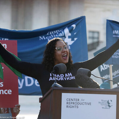 Renee Bracey Sherman, of We Testify, speaks to supporters organized by the Center for Reproductive Rights during a rally at the U.S. Supreme Court during oral arguments for June Medical Services v. Russo