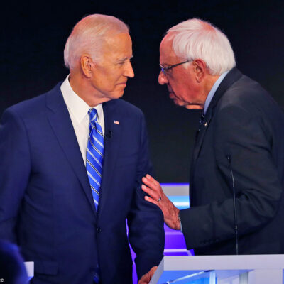 Joe Biden and Bernie Sanders are shown at the Democratic Debate