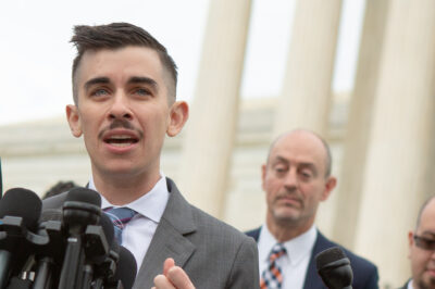 ACLU lawyer Chase Strangio speaking outside the Supreme Court.