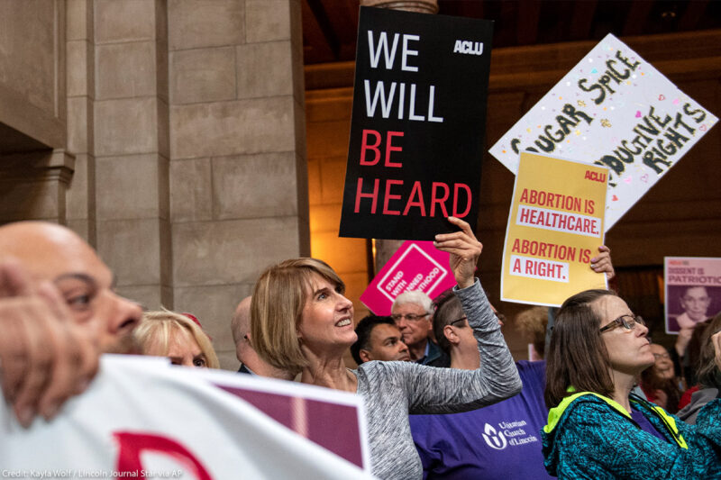 Supporters of abortion-rights attend a reproductive freedom rally at state capitol in Nebraska, holding ϰſ signs that read "We will be heard" and "abortion is healthcare."