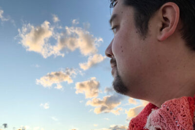 Shige Sakurai with the sky in the background.