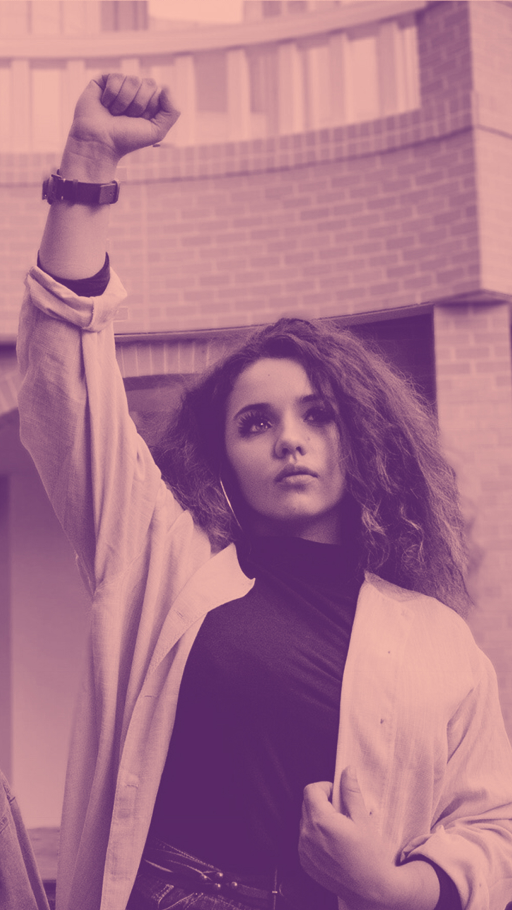 Girl raising first in protest on pink background