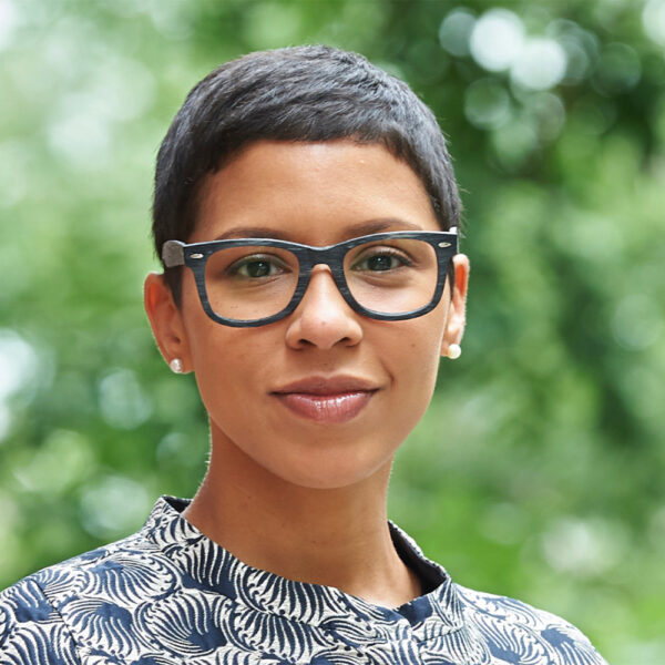 Headshot of Melissa Murray against a green background