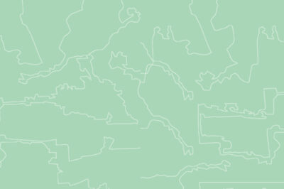 An outline of various states in the United States, against a light green background.