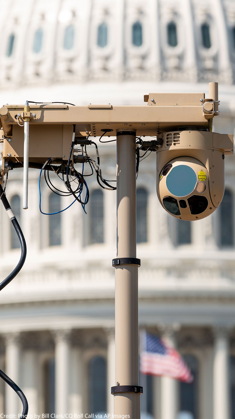 A close-up of a video surveillance unit set up in front of the U.S. Capitol building.