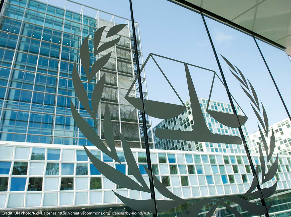 Image showing the symbol of the International Criminal Court on a window at the Hague