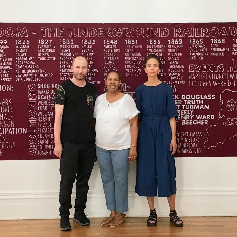 Sasha Huber and Petri Saarikko with Debbie-Ann Paige