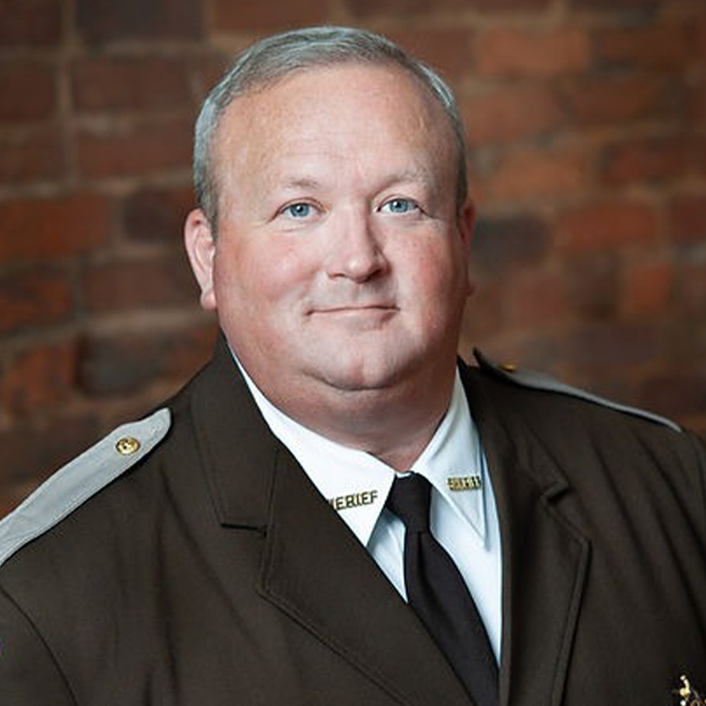 A closeup of sheriff Scott Jenkins in his uniform.