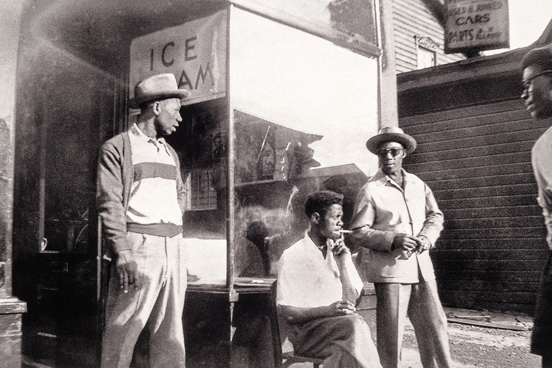 Sam Adams and friends at an ice cream parlor.