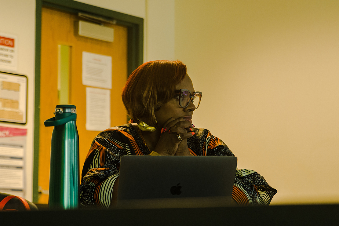 Dr. Dana Thompson Dorsey listening in on a class discussion.