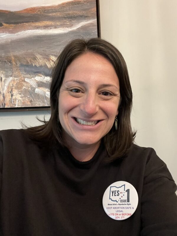 Headshot of educator Alexis Storch Morrisroe smiling.