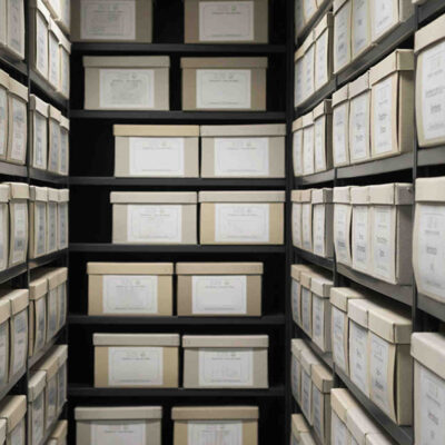 A storage room filled with data boxes from top to bottom