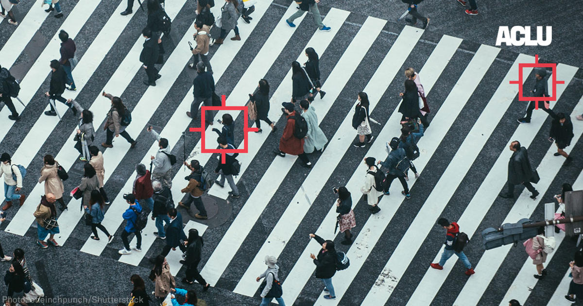 people crossing the street, one identified by ai