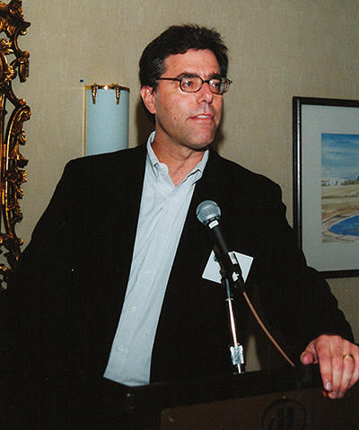 Steve Shapiro standing at a podium