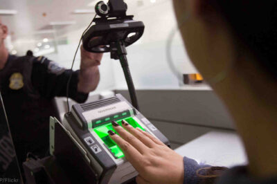 person scanning fingerprint