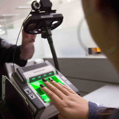 person scanning fingerprint