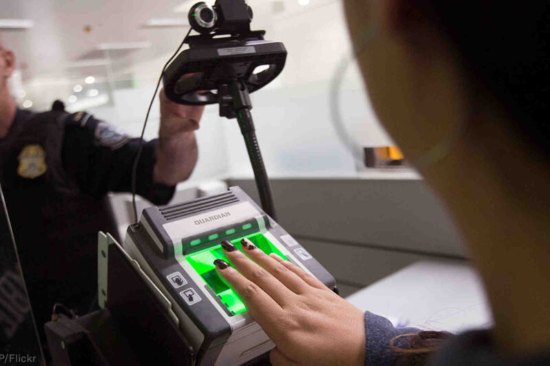 person scanning fingerprint