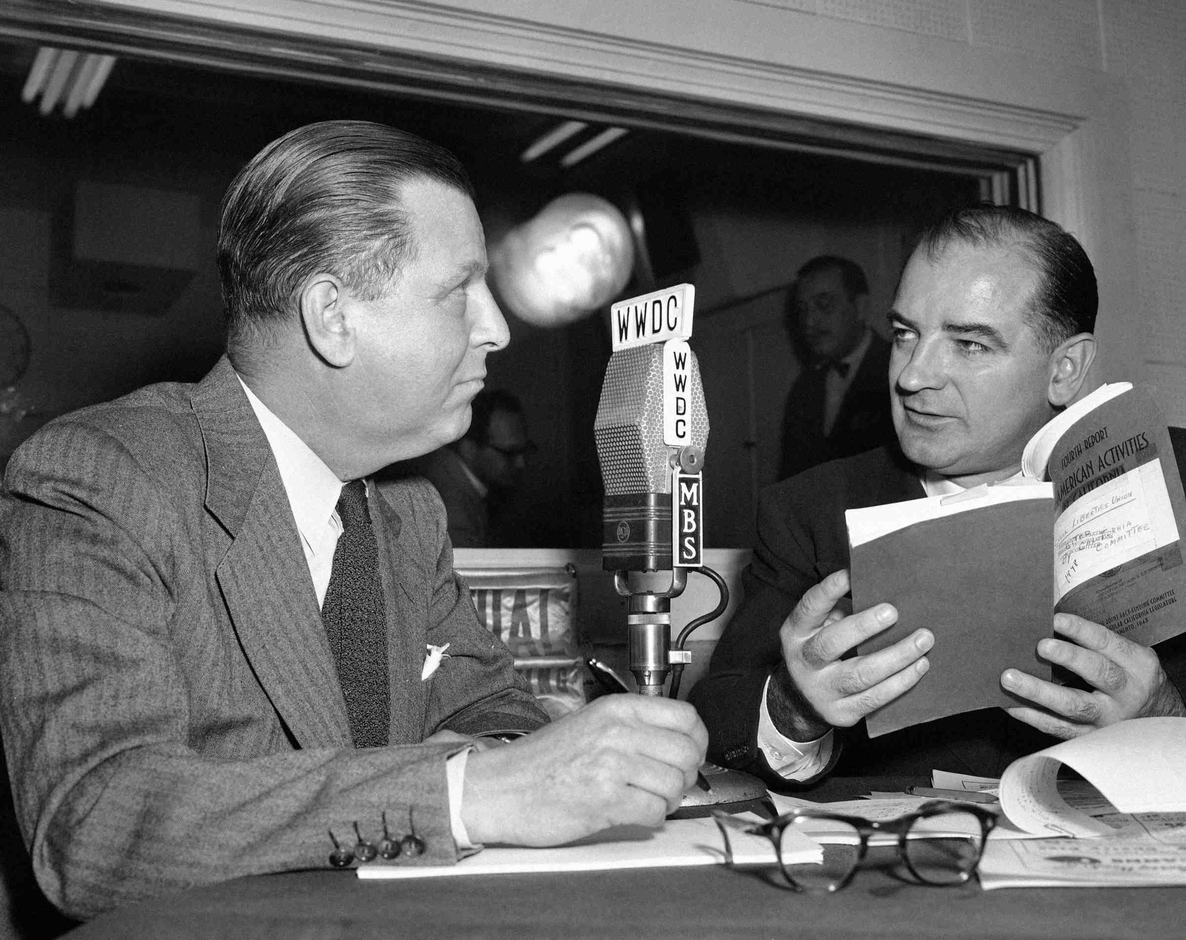 Sen. Joseph McCarthy (R-Wis.) appearing on a nationwide radio program with Fulton Lewis Jr., left. (Associated Press)