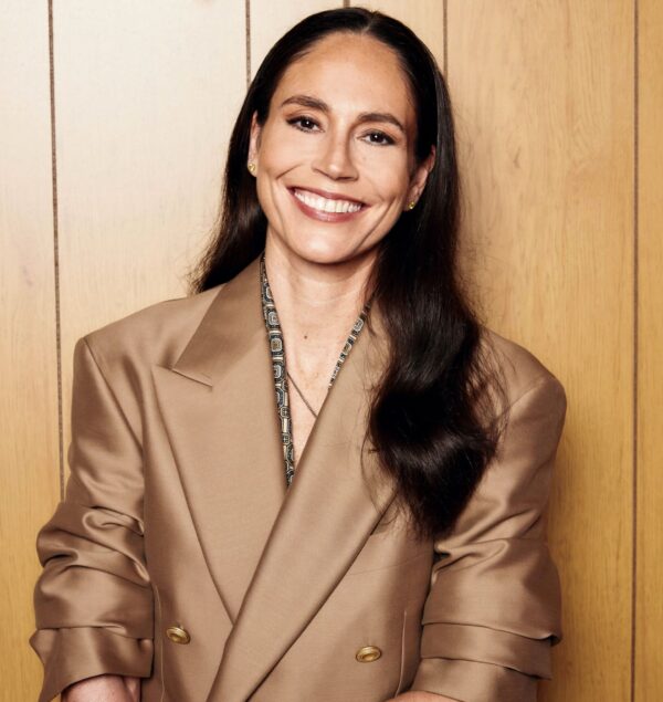 WNBA champion Sue Bird smiles in her headshot