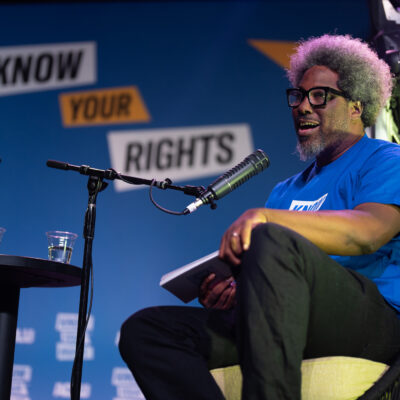 W. Kamau Bell onstage interview during the Know Your Rights bus tour.