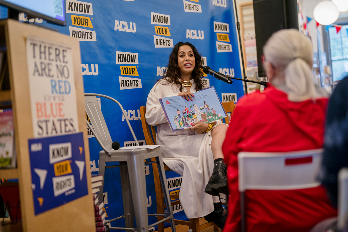 Storytelling in a bookstore hosting the KNOW YOUR RIGHTS bus tour.