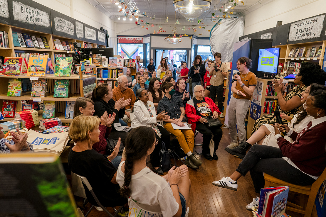 Storytelling in a bookstore hosting the KNOW YOUR RIGHTS bus tour.