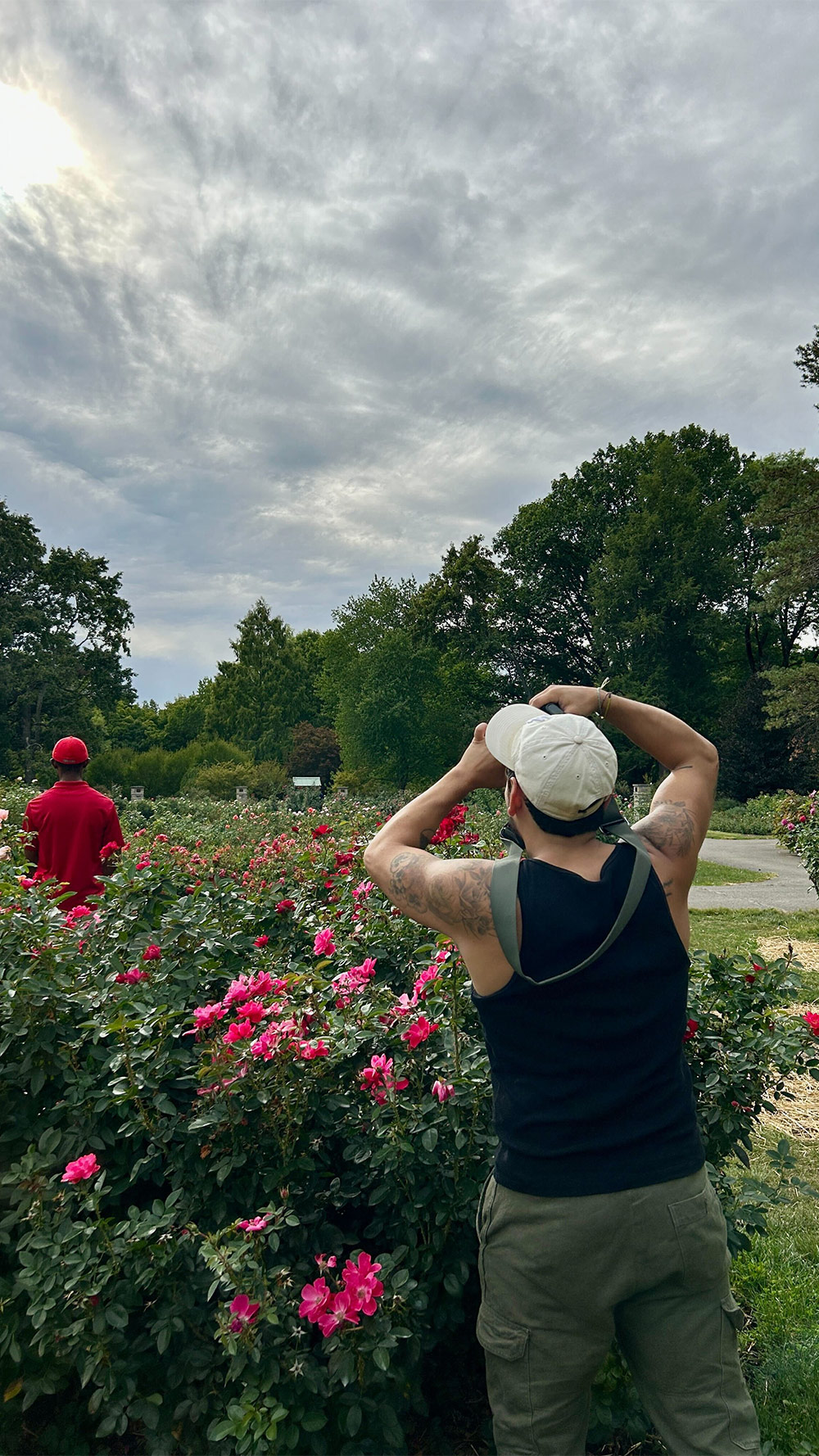 A photographer taking shots behind the scenes for "The Long Road Home" article.